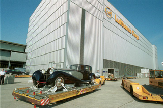 Illustration for article titled How Lufthansa gets the world's most exotic cars airborne